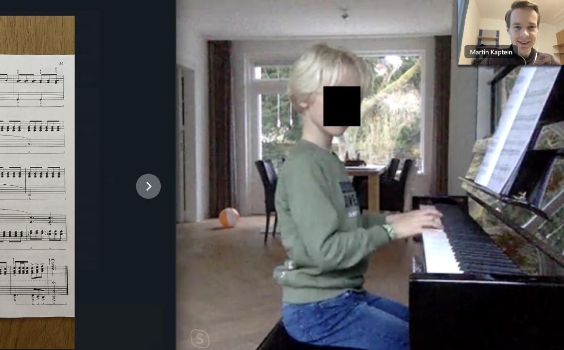 Young Piano Student during online lesson